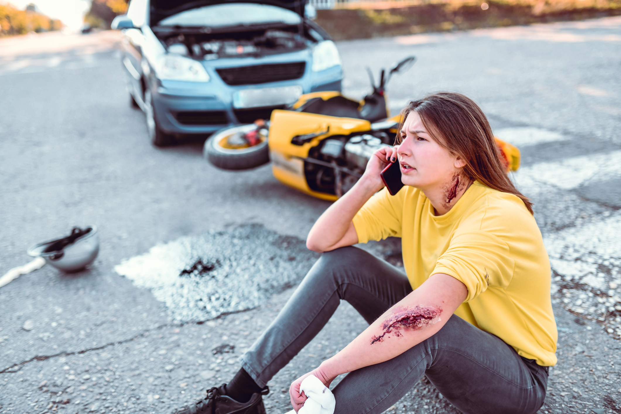 Car Accident Aftermath - Female Calling Emergency Services